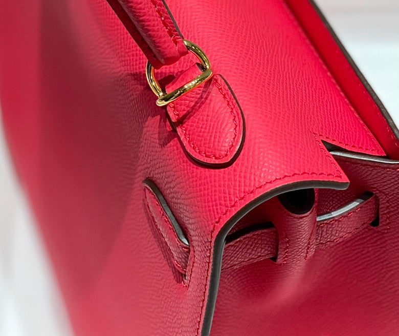 KELLY 25CM IN ROSE TYRIEN SWIFT CALFSKIN GOLD HARDWARE