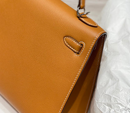 KELLY 25CM IN GOLD EPSOM CALFSKIN SILVER HARDWARE
