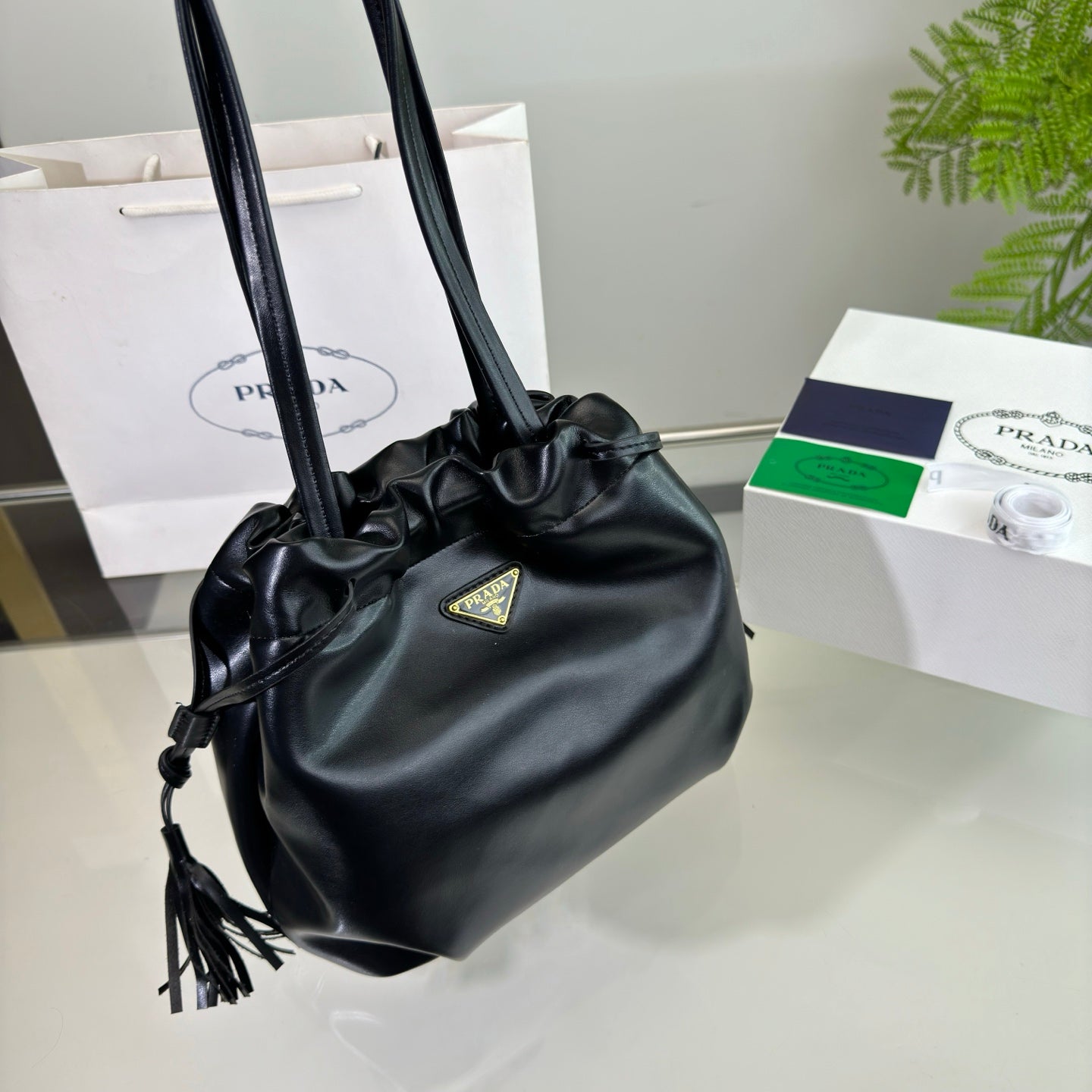 DRAWSTRING BUCKET BAG 25 IN BLACK SOFT LAMBSKIN